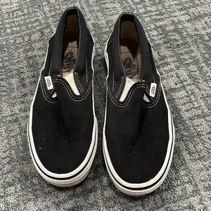 Women’s black low top vans